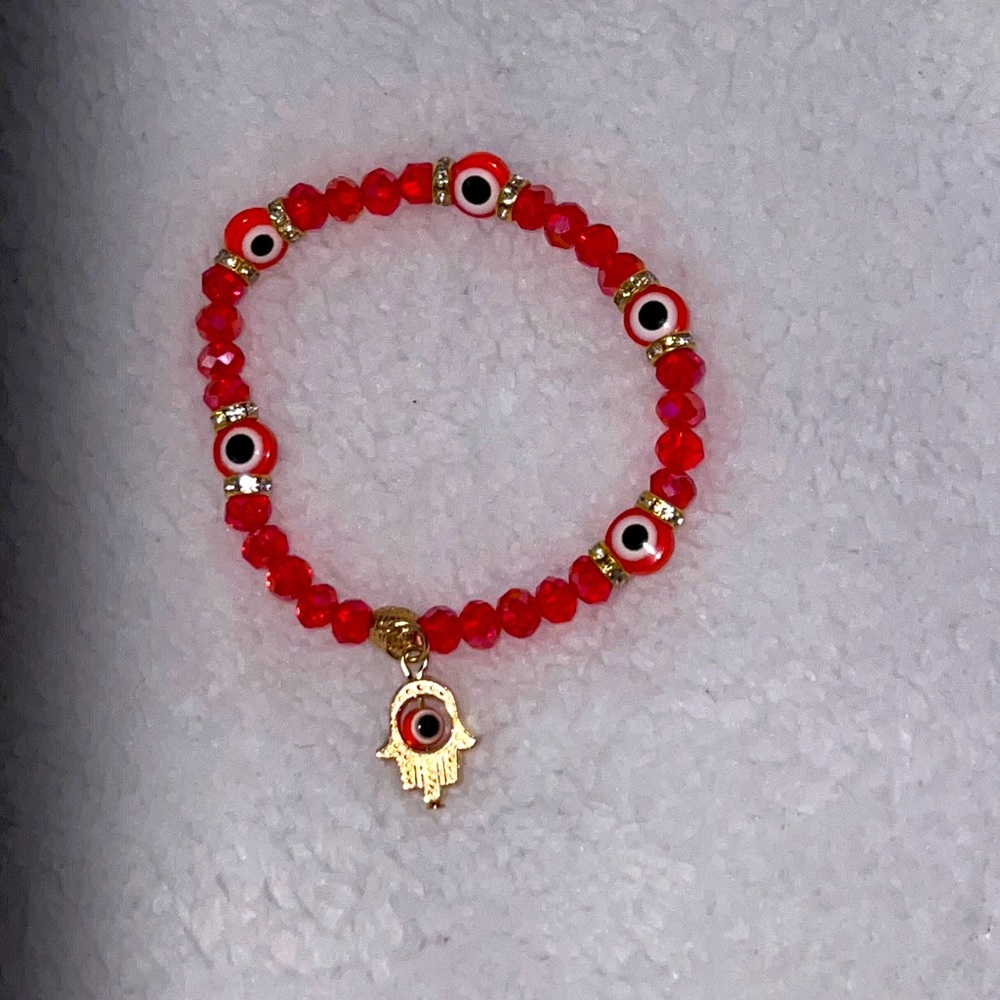 Stretchy 🧿 evil eye protection bracelet with hamsa charm